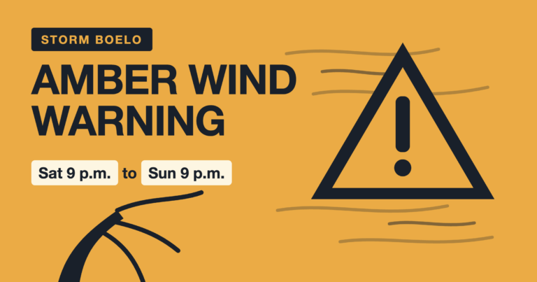 Storm Boelo amber warning cover: a dark warning triangle beside a tree bent by the wind
